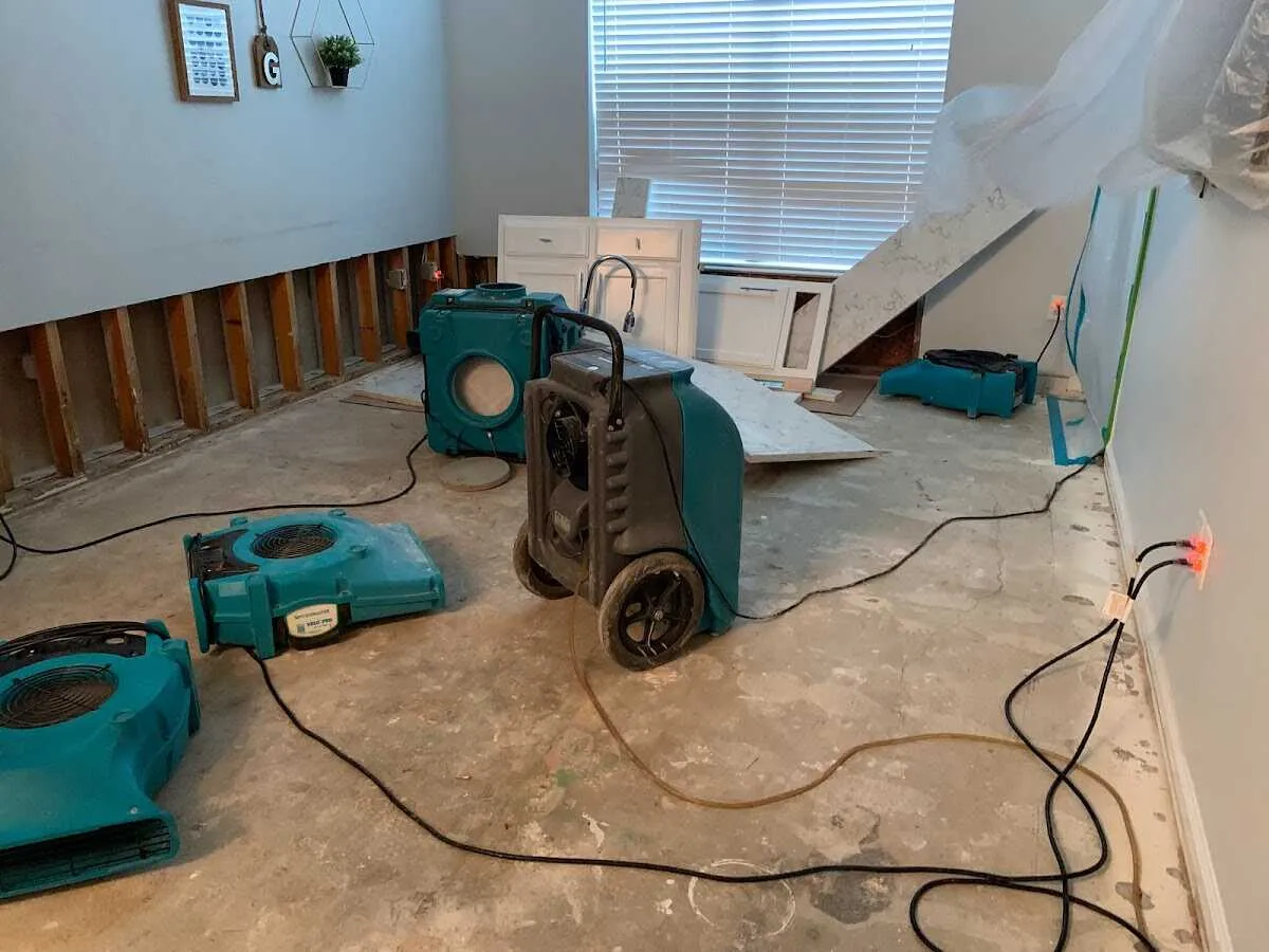 Dehumidifier in flood-cut room for Water Damage Restoration in Shallotte